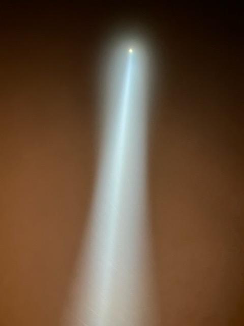Looking straight up a Hollywood searchlight beam
