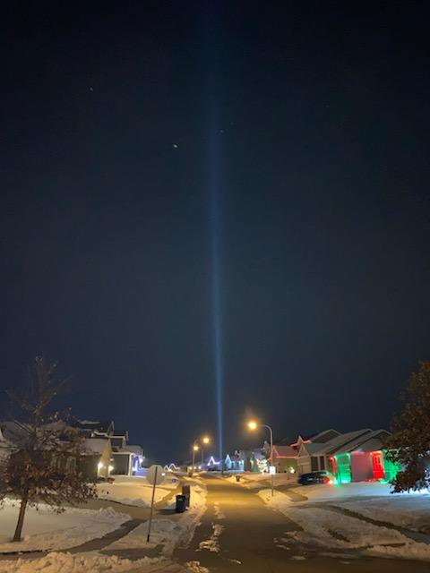 The same searchlight beam seen from half a mile away